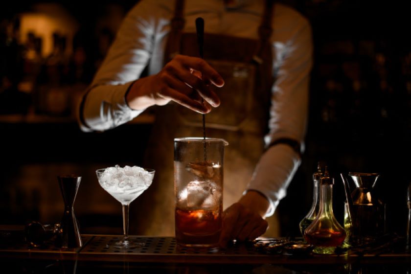 bartender stirring cocktail